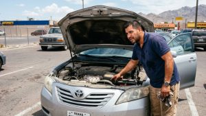 Driver dealing with vehicle problems before applying for a loan for car repairs in El Paso
